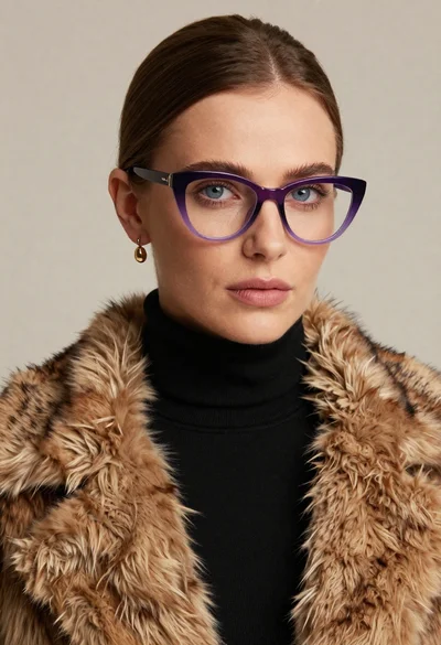 Portrait of woman with blue eyes wearing purple cat eye glasses