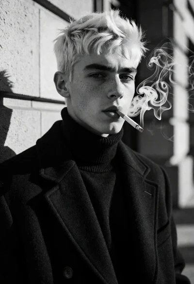 Black and white portrait of young man with platinum blonde hair smoking