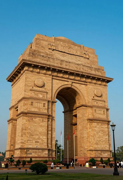 Low angle view of india gate war memorial under golden sunlight