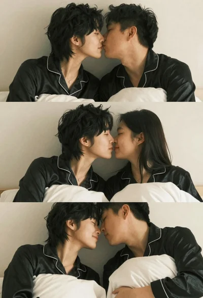 Young asian couple in black satin pajamas cuddling in minimalist bedroom