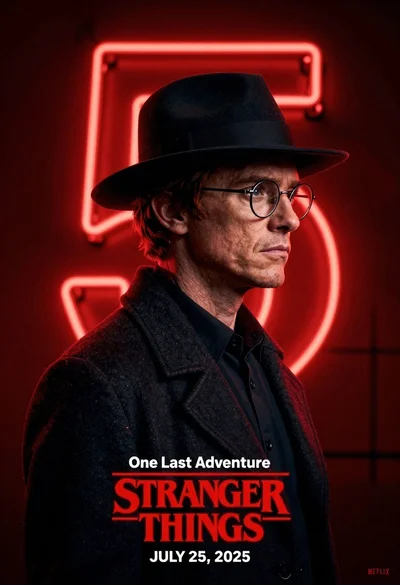 Man in black fedora and glasses posing before glowing neon number five