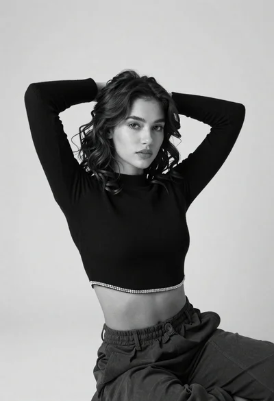 High fashion black and white portrait of woman in studio setting