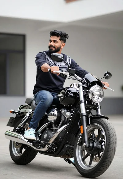 Young man on black motorcycle in paved area with blurred modern building