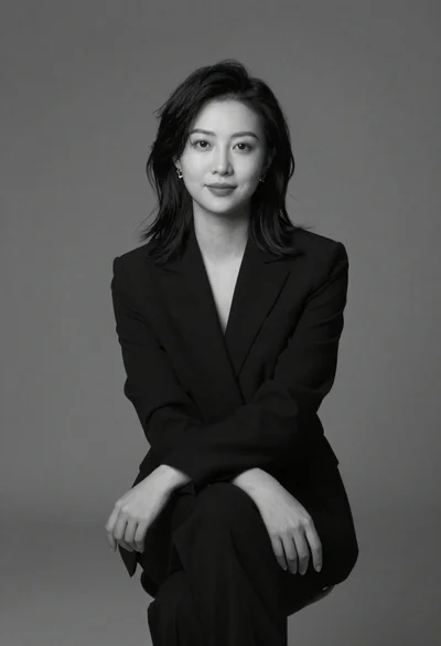 Black and white portrait of woman in studio
