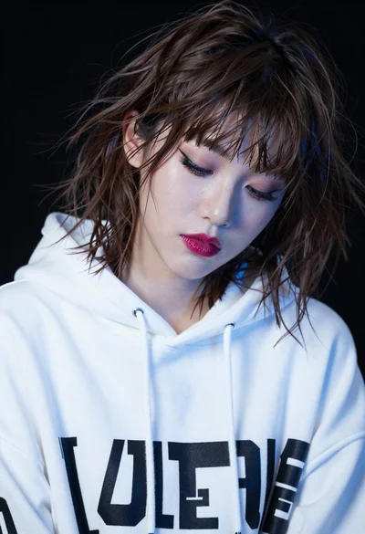 Close up portrait of young woman with brown hair studio lighting