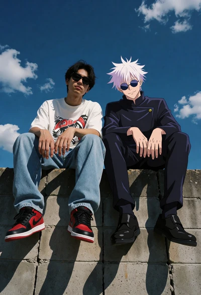 Man and anime character sitting together on concrete wall under blue sky