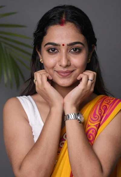 Close up portrait of young woman with bindi framing face