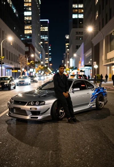 Young man leaning on a modified sports car in city night