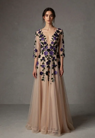 Full length portrait of woman in embroidered champagne evening gown